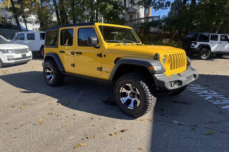 2018 Jeep Wrangler Unlimited in Yellow for sale at Iron Wolf Motors in Worcester, MA